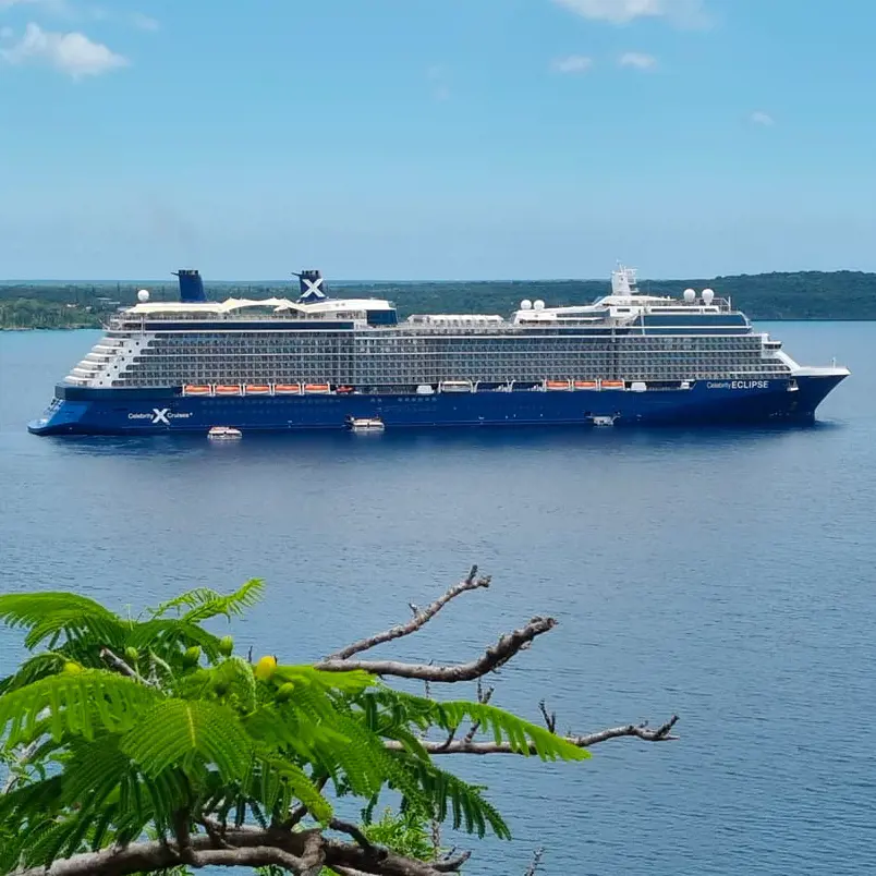 The Celebrity Eclipse anchored off Lifou, New Caledonia in 2022, photo by Grahame Lane