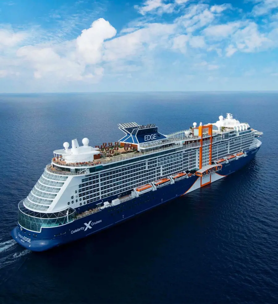 Celebrity Edge sailing under the clear blue sky in 2021