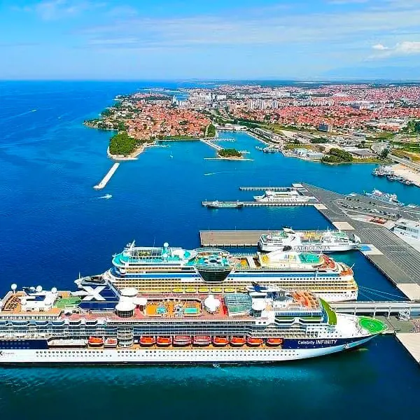 An ariel view of the Celebrity Infinity docked at a port in Croatia in 2020