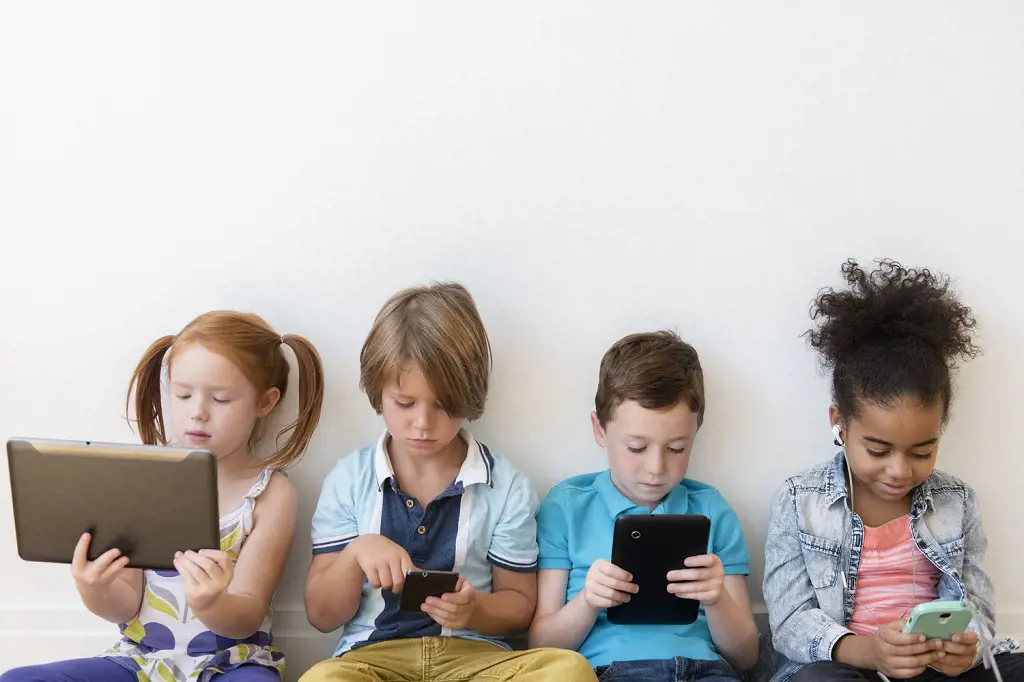 Children using a variety of electronic devices
