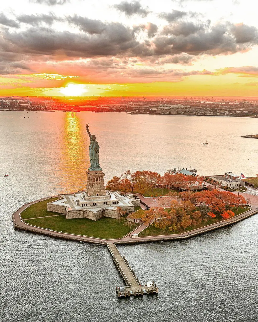 Stunning view of the Statue of Liberty at sunset (photo by @mingomatic)